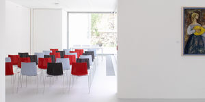 contemporary chair / with armrests / with washable removable cover / upholstered