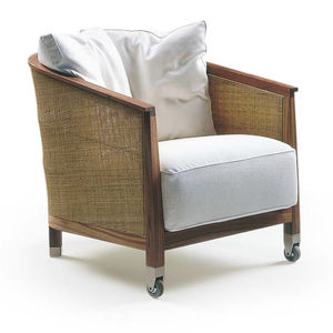 contemporary armchair / wooden / fabric / leather