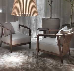 contemporary armchair / fabric / leather / solid wood