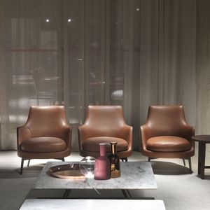 contemporary armchair / fabric / leather / solid wood