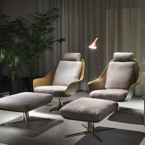 contemporary armchair / fabric / leather / metal