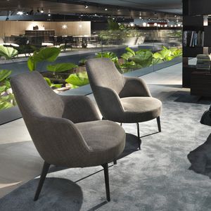 contemporary armchair / fabric / leather / wooden