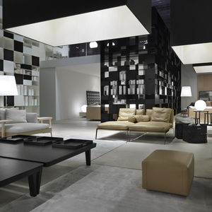 contemporary lounge chair / fabric / leather / indoor