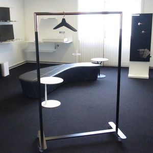 contemporary clothes rack / steel / on casters