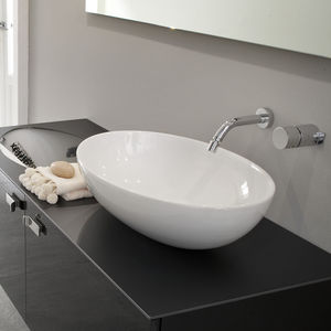 countertop washbasin / oval / ceramic / contemporary