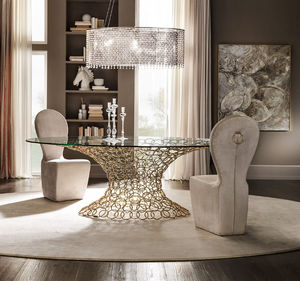 contemporary chair / upholstered / medallion / fabric