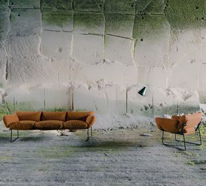 contemporary sofa / steel / polyester fiber / fabric