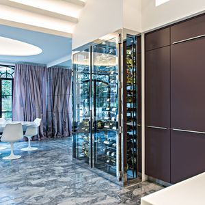built-in wine cabinet / stainless steel / glazed / custom
