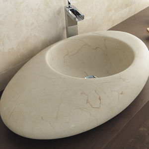 countertop washbasin / oval / natural stone / contemporary