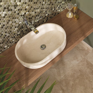 countertop washbasin / oval / natural stone / contemporary