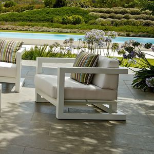contemporary armchair / fabric / lacquered aluminum / sled base