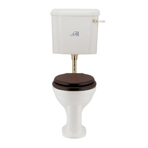 free-standing toilet / porcelain / with lever / with low tank