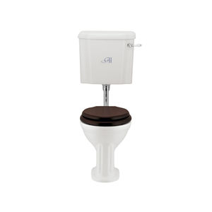 free-standing toilet / porcelain / with lever / with low tank