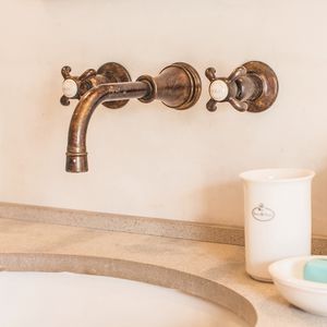 double-handle washbasin mixer tap / wall-mounted / chromed metal / bathroom