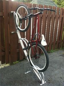 wall-mounted bike rack / aluminum / for public spaces