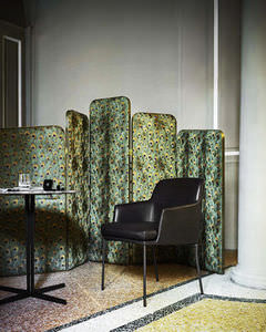 contemporary chair / upholstered / with armrests / leather
