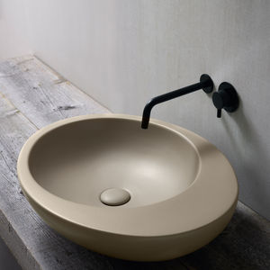 countertop washbasin / oval / ceramic / original design