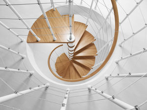 spiral staircase / wooden steps / metal frame / without risers
