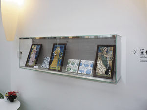 contemporary display case / wall-mounted / glass / stainless steel