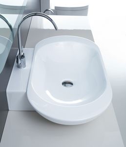 countertop washbasin / oval / ceramic / contemporary