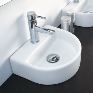 free-standing hand basin / semicircular / ceramic