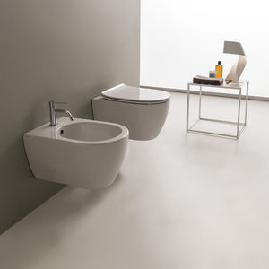wall-hung toilet / ceramic