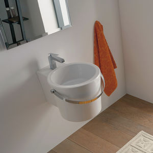 wall-mounted washbasin / round / ceramic / contemporary