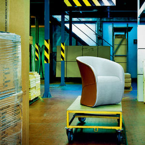 contemporary armchair / fabric / leather / cowhide