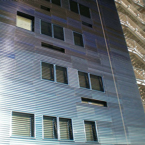 glass solar shading / for facades / vertical / motorized rotating
