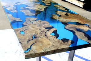 contemporary dining table / wooden / resin / rectangular