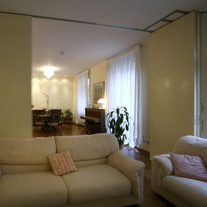 sliding and stacking partition / laminate / residential / without floor track