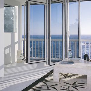 sliding and stacking patio door / aluminum / double-glazed / thermal break