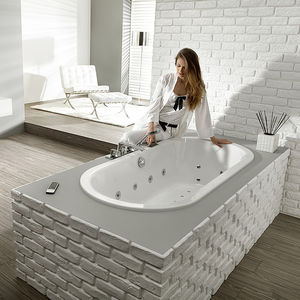 oval bathtub / acrylic / by Philippe Starck