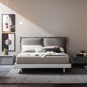 double bed / contemporary / with upholstered headboard / lacquered wood