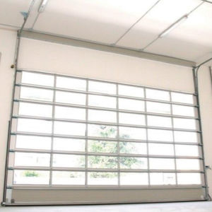 sectional industrial door / metal / automatic / hydraulic