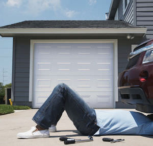 sectional garage door / steel / automatic