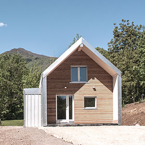 individual house / prefab / contemporary / wooden frame