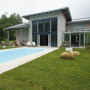 individual house / prefab / contemporary / wooden frame