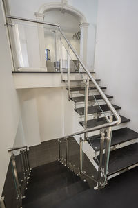 half-turn staircase / stainless steel frame / wooden steps / without risers