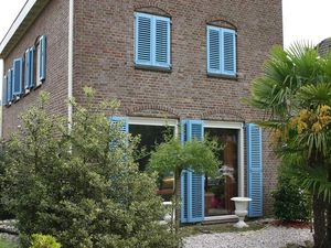 folding shutters / wooden / door / insulated