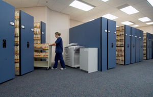 mechanical mobile shelving / archival / for offices / metal