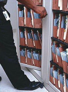 standard rotating shelves / archival / for offices / metal