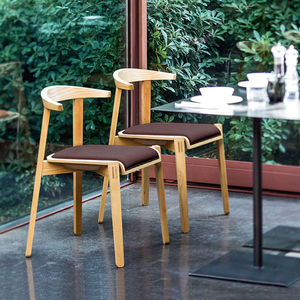 contemporary chair / upholstered / standard base / FSC-certified