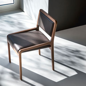 contemporary chair / upholstered / standard base / FSC-certified