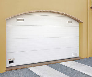 sectional garage door / galvanized steel / automatic / curved