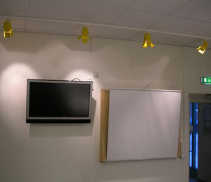 LED track light / linear / cast aluminum / steel