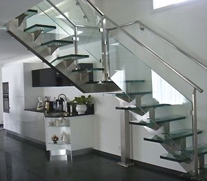 quarter-turn staircase / metal frame / glass steps / central stringer