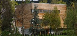 prefab house / minimalist / wooden frame / larch