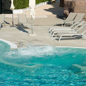 in-ground swimming pool / concrete / for hotels / outdoor
