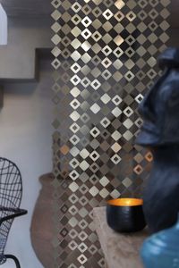 geometric curtain / metal / stainless steel